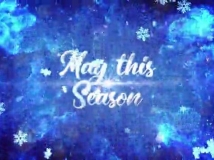 绚丽蓝色粒子特效中的圣诞文字祝福开场动画